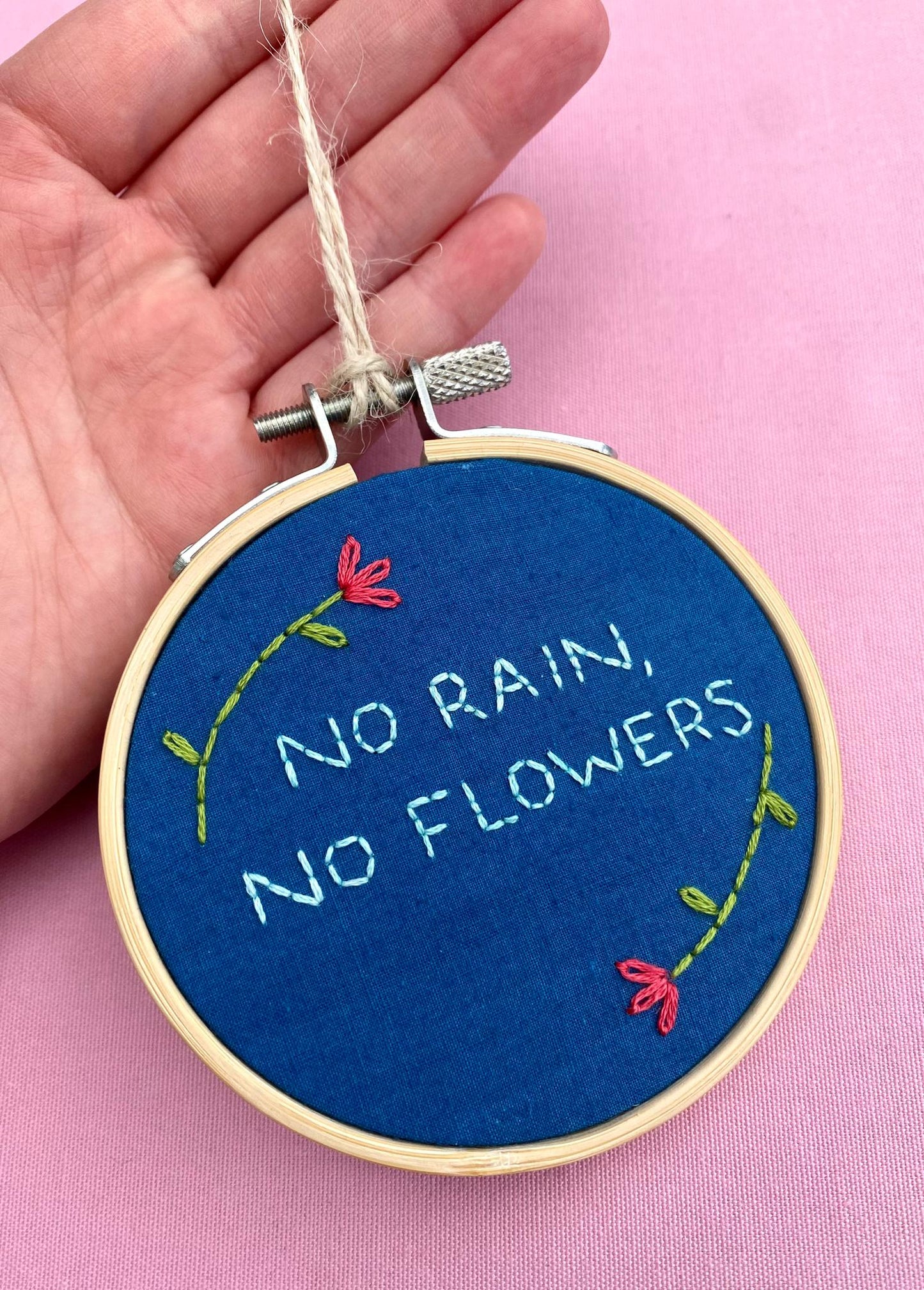 'No Rain, No Flowers' Hand Embroidered Mini Wall Hanging