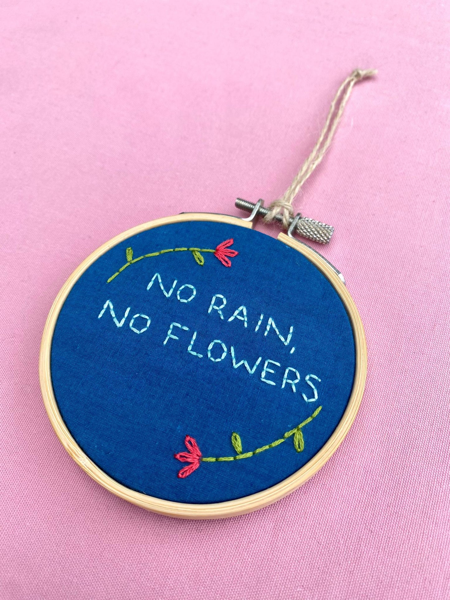 'No Rain, No Flowers' Hand Embroidered Mini Wall Hanging