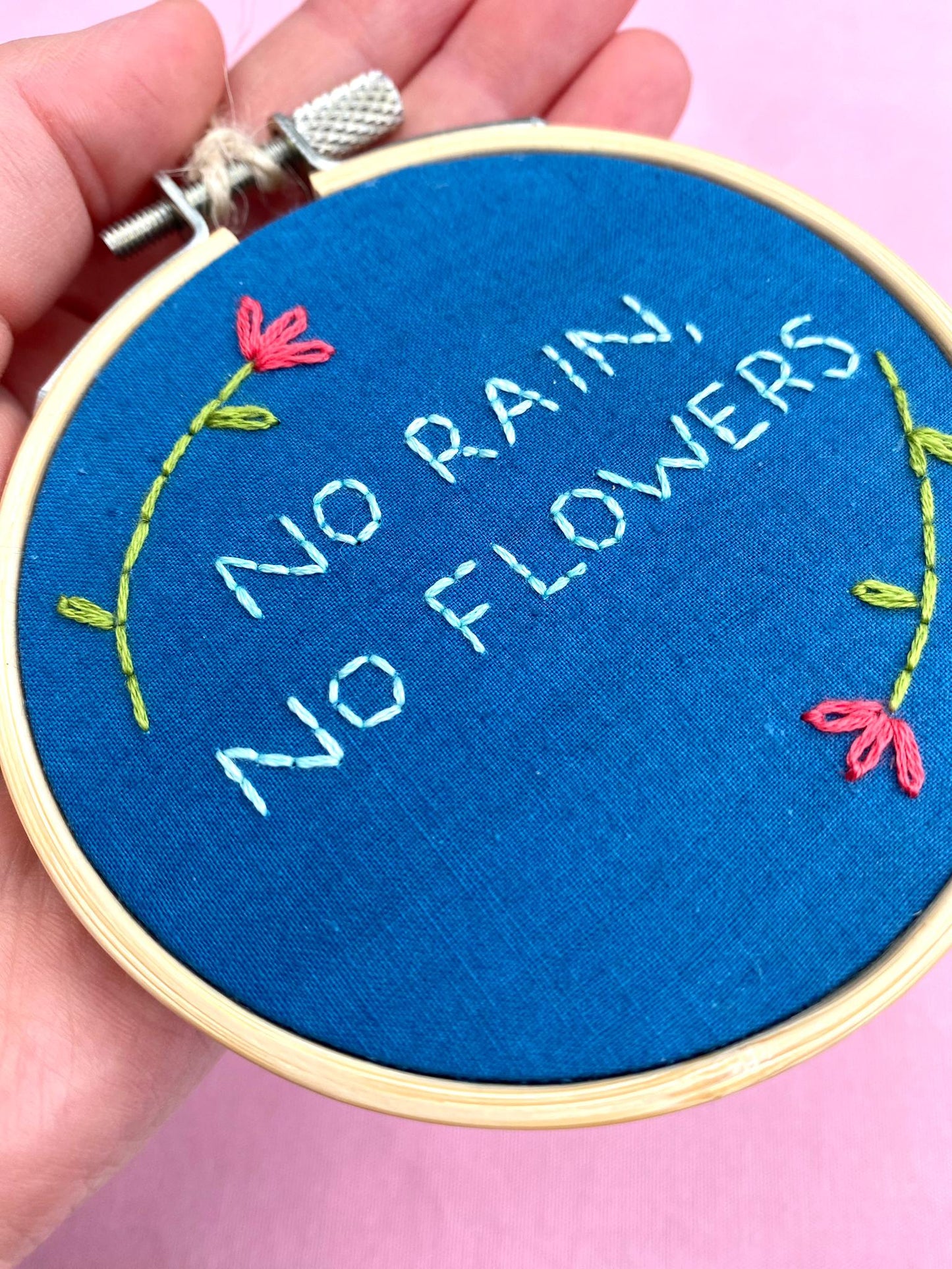 'No Rain, No Flowers' Hand Embroidered Mini Wall Hanging