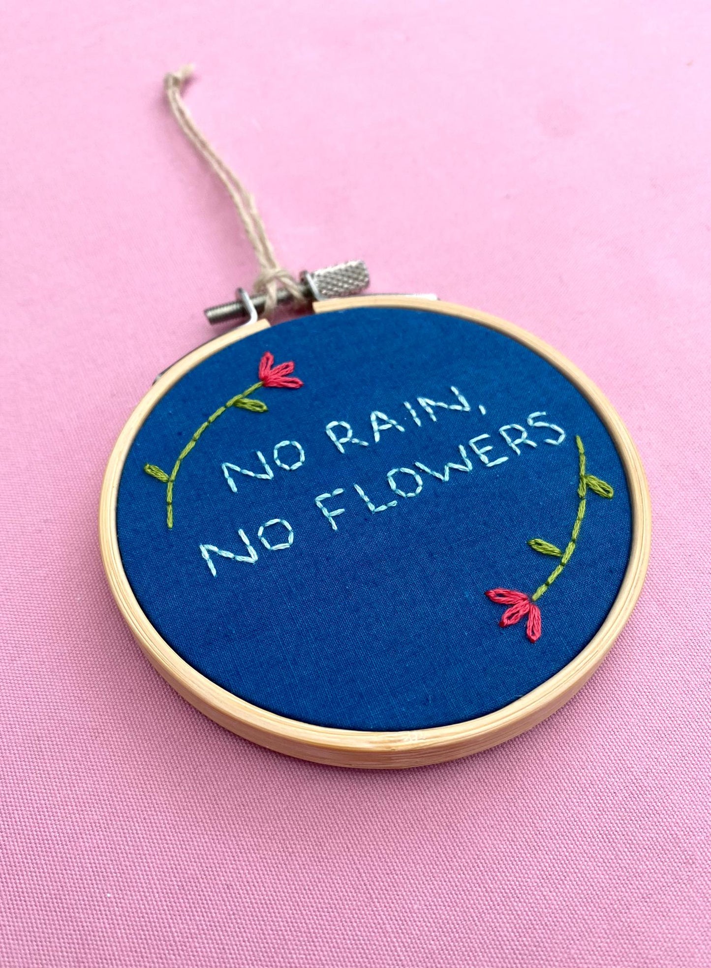 'No Rain, No Flowers' Hand Embroidered Mini Wall Hanging